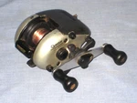 #1743- Zebco Quantum QL2000 Bait Caster Fishing Reel Working. Fixed Price $18.50.