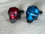 Zebco Slingshot Spin Cast Reels Lot Of 2. Fixed Price $27.99.