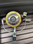 Shimano Symetre Metallic Green Fishing Spinning Reel 1500RJ. Fixed Price $75.00.