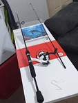 Spinning Fishing Rod Shakespeare Ardent Overgrip 6' Med 4-12LB And Reel Zebco. Fixed Price $45.00.