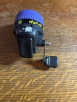 Discontinued Product South Bend Spincast Reel Danny Dinosaur. Fixed Price $14.99.