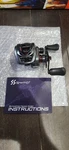 Left Handle Sougayilang Baitcasting Fishing Reel Dark Grey Red Good Quality. Fixed Price $20.50.