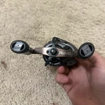 Abu Garcia Revo X Low Profile Baitcast Reel Right Hand 6.4:1 10BB Gray. Fixed Price $65.00.