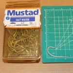 Box Of Mustad Fishing Hooks 8/0 3412C Needle Eye 14OZ. Fixed Price $52.10.