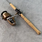 Vtg Ice Fishing Rod W Zebco 40 Xrl Spinning Reel And Lure. Fixed Price $16.95.