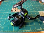 V5713 Pf Lews Speed Spin HS200 Reel Fishing. Fixed Price $35.00.