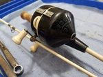 Zebco 77 Vintage Spincast Combo Black White Wood Handle Rod Reel Fishing Set. Fixed Price $25.00.