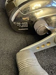 Shimano Calais CL200 Baitcast Reel Right Hand 11 Bearings, W/cover. Fixed Price $279.99.