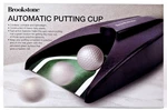 Brookstone Automatic Putting Cup Cordless Portable Fast Action. Fixed Price $17.95.