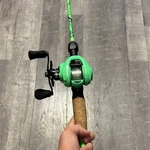 Lew's Green Baitcast Combo Casting Rod & Reel With Cork Handle. Fixed Price $140.00.