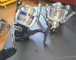 Abu Garcia 100U New + Daiwa D-shock 1500-BI Used Spinning Reels Panfish. Fixed Price $44.97.