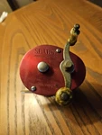 Vintage Sears Roebuck Fishing Reel Red Model 535.39660 Open Bait Casting. Fixed Price $15.00.