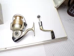 Daiwa LT2000B Sweepfire Spinning Reel - Gold/silver. Fixed Price $20.00.