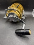 Penn International 30 Conventional Trolling Reel Right Hand Star Drag Gold. Fixed Price $225.00.
