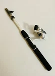 New South Bend Trophy Stalker Telescopic Spinning Rod And Reel Combo 5.0". Fixed Price $31.84.