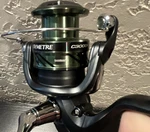 Shimano Symetre C3000HG Spinning Reel 6.2:1 4+1BB Front Drag Green/black. Fixed Price $85.00.