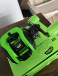 13 Fishing - Modus RP2 Radioactive Pickle Baitcast Reel 7.3:1 Rh Brokebox. Fixed Price $69.99.