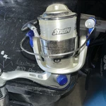 Catch More Surf Pier Spinning Reel, 7' Medium Fishing Rod, SP50A W/lures. Fixed Price $45.85.
