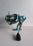 Pflueger Lady Trion Tril 35 Blue Spinning Reel. Fixed Price $16.54.