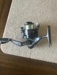 Shakespeare Ugly 025 Black Spinning Reel. Fixed Price $15.88.