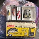 Vintage Zebco Fishing Gift Set 'de-liar' Scale And 3 Lures With Box. Fixed Price $100.00.