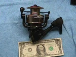 HE7000 Spinning Professional Fishing Reel Sold As Found Un-used?. Fixed Price $14.99.