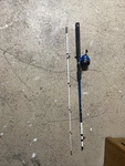 Shakespeare Tiger Fishing Rod Spin Cast Reel 6. Fixed Price $25.00.