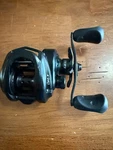 Abu Garcia REVO4 X Right Hand Baitcast Fishing Reel 6.6:1 Black. Fixed Price $70.00.