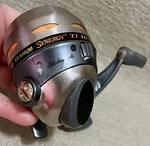 Shakespeare Synergy Titanium 10 Spin Cast Fishing Reel Anti-reverse & Click. Fixed Price $20.00.