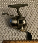 Shakespeare Synergy Microspin Steel Titanium Spincast Fishing Reel Trigger Syms. Fixed Price $22.99.