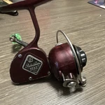 Shakespeare 2052 Vintage Spinning Fishing Reel Maroon With Green Handle. Fixed Price $40.00.