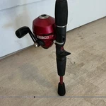 Zebco Slingshot Spincast Rod And Reel Combo Red Black Includes. Fixed Price $9.99.