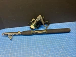 Coleman Outfitter CO100F Fishing Reel Right Or Left Hand With Pole. Fixed Price $40.00.
