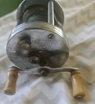 Vintage Pflueger Trump Casting Fishing Reel Trademark No. 1943. Fixed Price $20.00.