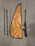 Vintage Zebco 33 & Reel, Centenial Pack Rod, Model# 6104 With Original Pouch. Fixed Price $109.00.